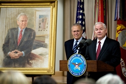 Defense Secretary Robert M. Gates, right, addresses the audience while former Defense Secretary Donald H. Rumsfeld looks on during Rumsfeld's portrait unveiling ceremony at the Pentagon, June 25, 2010. DoD photo by Cherie Cullen  