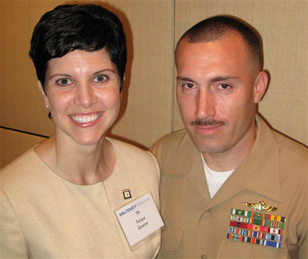 Tanya Queiro, the 2009 Military Spouse of the Year, stands with her husband, Marine Gunnery Sgt. Jose Queiro, following an awards ceremony in Washington, D.C., May 7, 2009. Queiro, who achieved the rank of staff sergeant during her own 13 years in the Marine Corps, also was recognized as the Marines� top military spouse for 2009. Defense Department photo by Gerry J. Gilmore  
