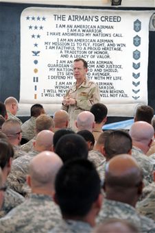 Navy Adm. Mike Mullen talks to servicemembers during an 