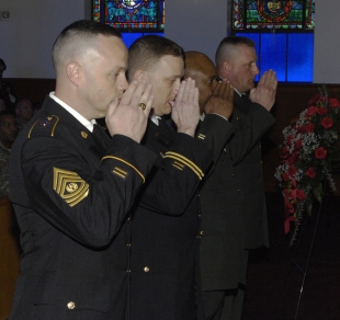 Army Reserve NCO Academy leadership salute as they render final honors at the close of the memorial service for Sgt. 1st Class Mary Russell held at Army Support Activity-Dix's Main Chapel, May 4. Russell died as the result of injuries sustained during a motor vehicle accident, April 20. Positioned left to right are NCO Acedemy Commandant Command Sgt. Maj. Peter Brooks of North Hampton, Mass., ASA-Dix Main Chapel staff chaplain, Maj. Bill Heisterman of Clifton, N.J., deputy commandant Sgt. Maj. McClinton Brown of Chicago, and 1st Sgt. Roy Waters of Wauconda, Ill. 